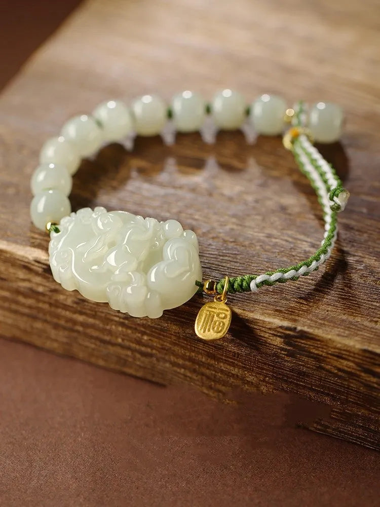 Year of Rabbit Chinese zodiac bracelet with Hetian jade charm, S925 silver card, and red ice cotton rope.