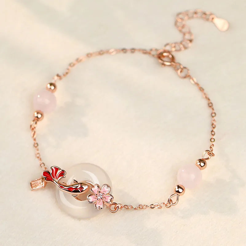 S925 sterling silver bracelet with white chalcedony crystal in a koi bracelet design for women.