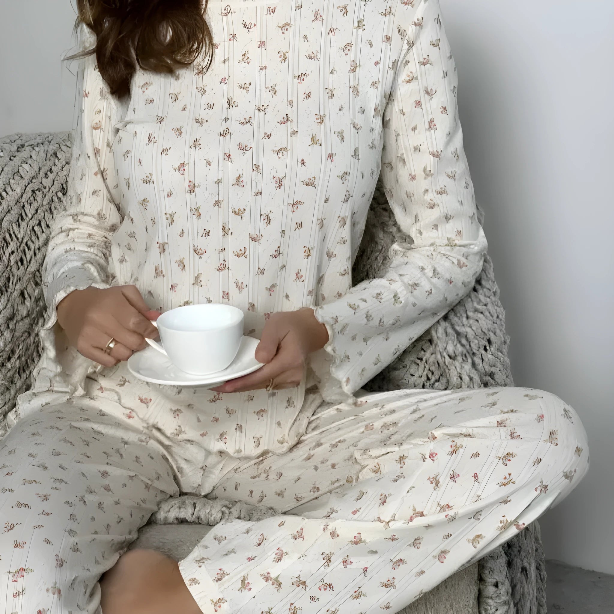 Women's white floral print two-piece suit with bell sleeve top and wide leg pants