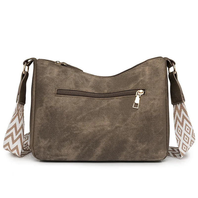 Women's large capacity one shoulder crossbody backpack in soft PU leather with waterproof finish, available in five colours