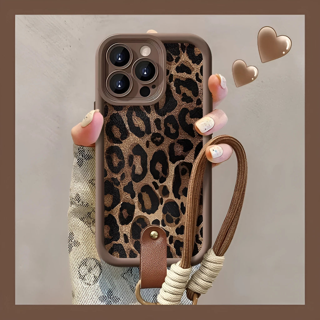 Brown leopard print silicone phone case for iPhone with an attached white lanyard strap.