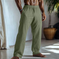 Cotton and linen straight leg casual trousers in light green with visible pockets