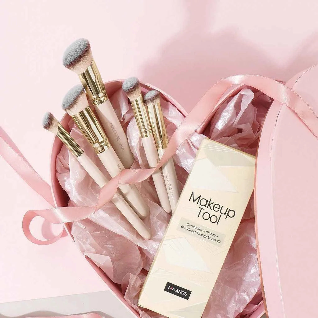 MAANGE five-piece apricot coloured makeup brush set with angled blush brush on a flat surface