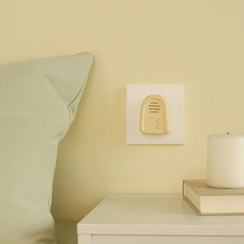 Wireless plug-in doorbell in milky yellow or white with self-generating battery-free technology