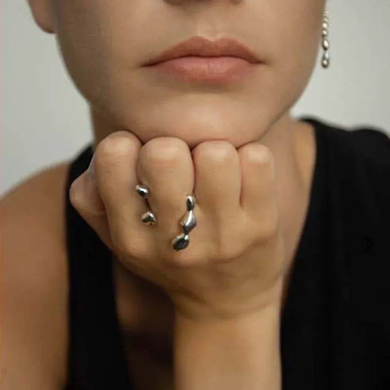 Brass spherical ring for women in gold or silver plating.