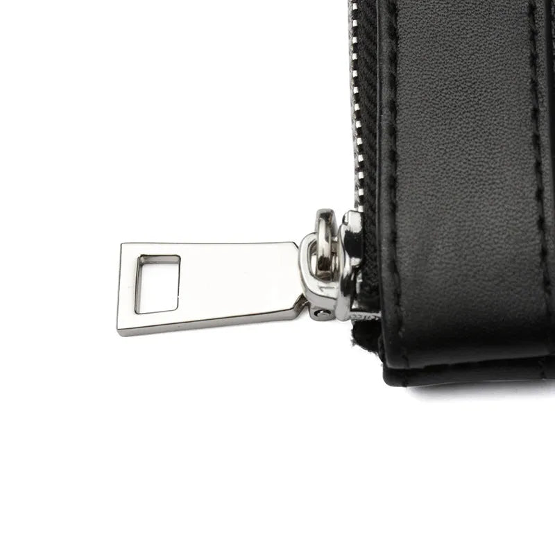 Men's black leather clutch wallet showing 20x10cm size and genuine cowhide material.