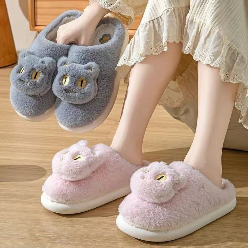 Cotton cat slippers with plush cat face design, memory foam insole, suede upper, available in multiple colours.