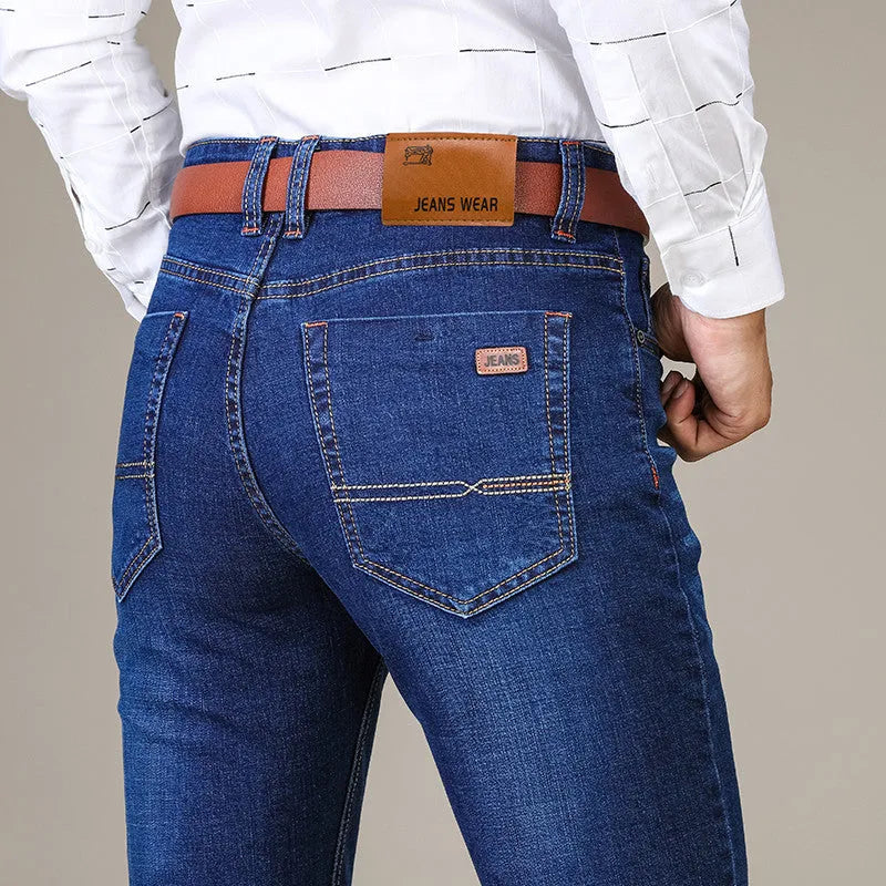 Men's stretch slim straight business casual jeans in blue cotton denim, available in sizes 28 to 40