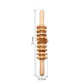 Beech wood massage roller kit showing T-shaped roller and assorted wheeled massagers on a table.