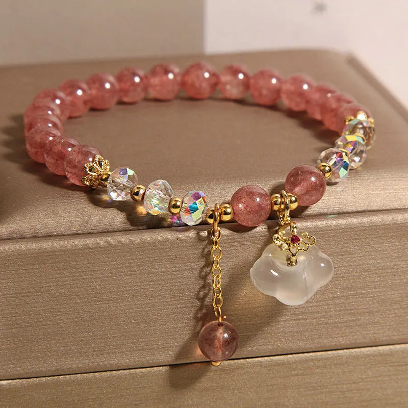 Women's natural crystal bracelet with strawberry quartz and white agate beads, auspicious cloud accents, 40g, on white background