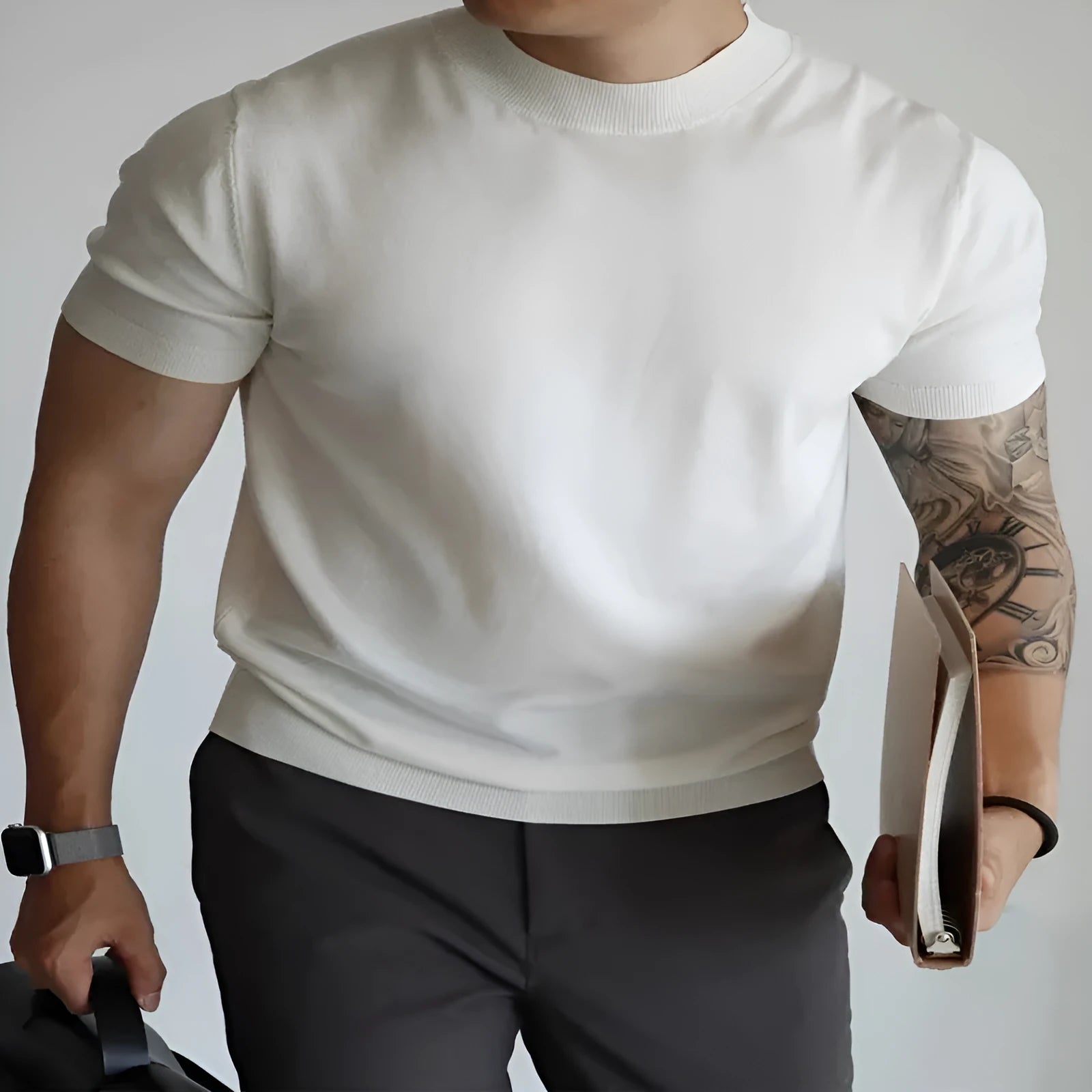 Men's slim-fit solid colour t-shirt in breathable polyester knitwear, shown in a neutral shade.