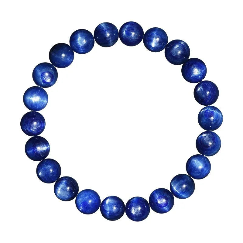 Blue crystal ball bracelet with geometric beads and a Ruyi charm on a white background.