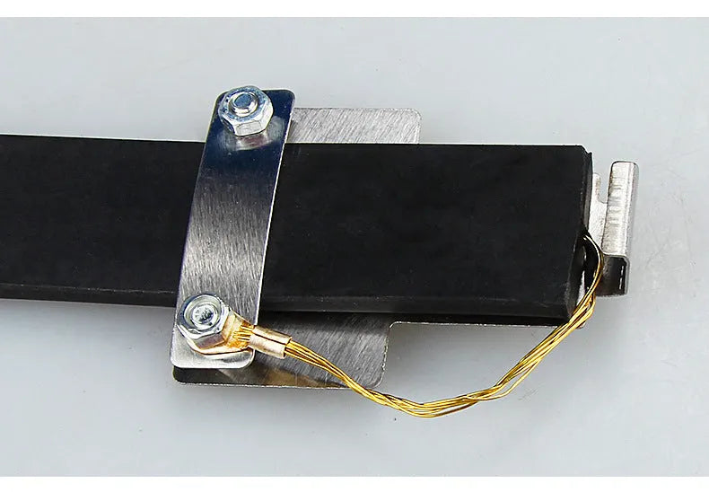Black rubber vehicle electrostatic grounding strap, 37cm long, for preventing static shocks on cars and vans.