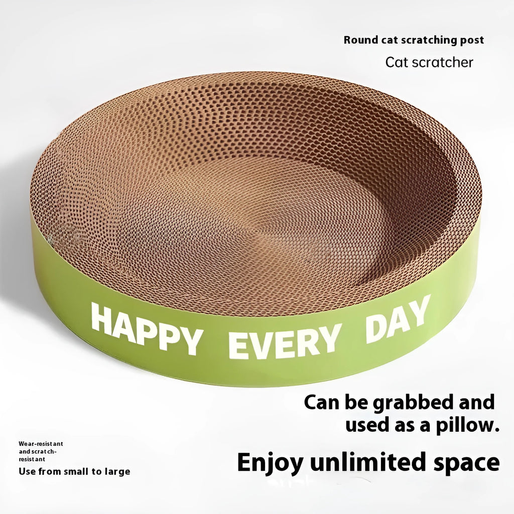 Green round cat nest with a textured sisal scratching board surface, shown in a home setting.