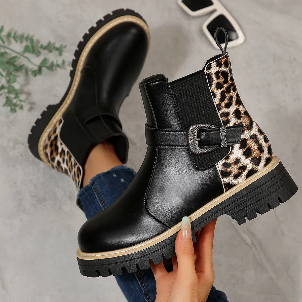 Plus-size women's black leopard print ankle boots with metal buckle, round toe, and mid-heel