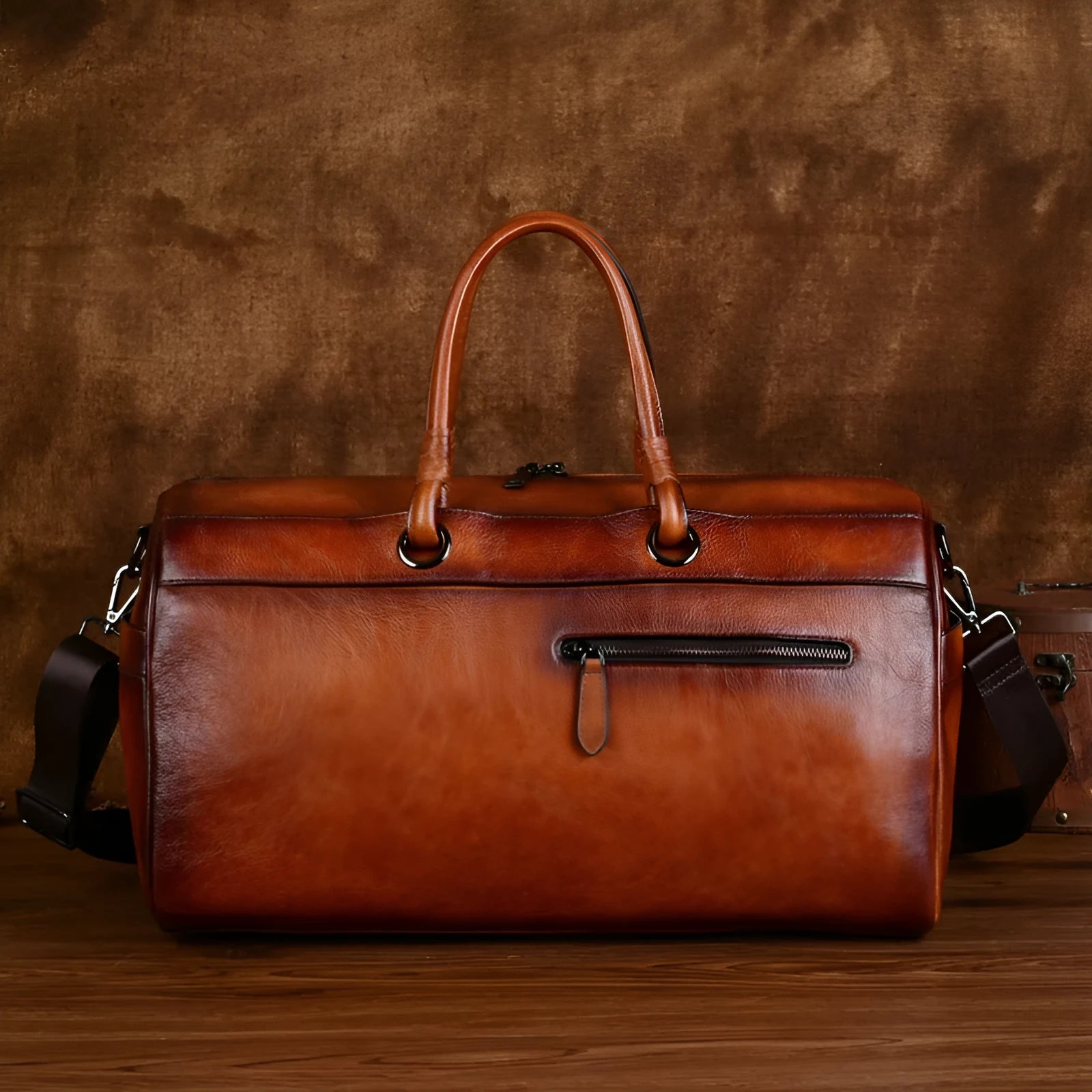 Genuine leather retro handbag in vintage brown colour showing handmade construction details