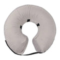 Blue inflatable recovery collar for a dog, showing soft cone alternative to plastic surgical collars.