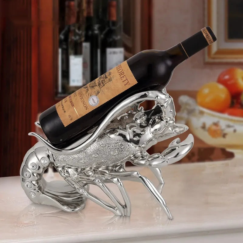 Lobster-shaped wine rack ornament in metallic rose gold or elegant silver colour