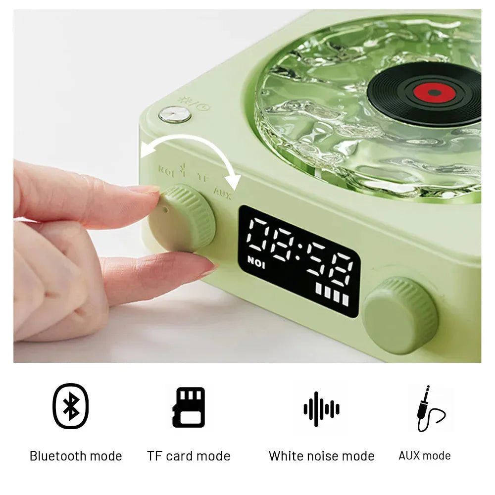 Retro turntable Bluetooth speaker with rotating vinyl and RGB projection lighting effects