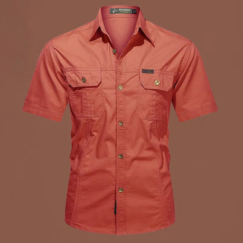 Men's army green short sleeve cotton work shirt with a loose cardigan fit on a hanger.