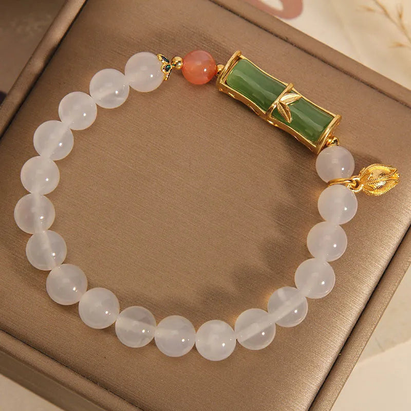 Chinese style bamboo beaded bracelet for women in white agate and jade with retro design