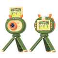 Purple children's digital camera with flip screen and attached silicone case lanyard on a cartoon map.