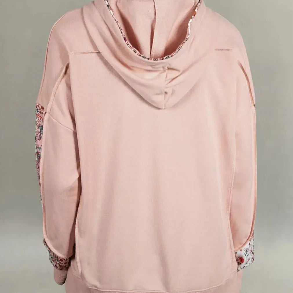 Women's pullover hoodie with drawstrings, loose fit, long sleeves, in pink colour, front view