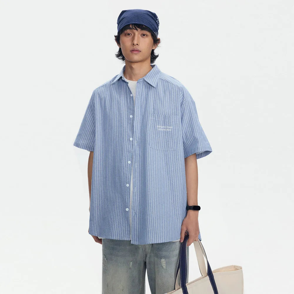 Blue striped overalls shirt for men and women in loose fit cardigan style with short sleeves