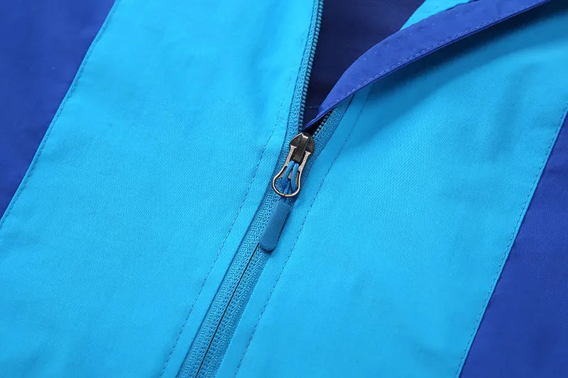 Blue thin long sleeve jacket for boys, with full zip, designed for autumn wear.