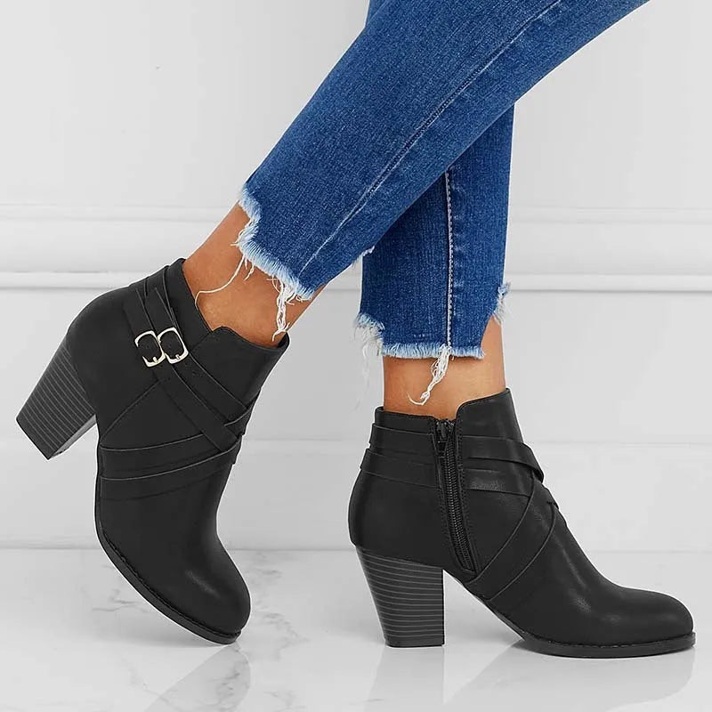Grey PU leather short ankle boots with a side zipper, buckle strap, and a chunky 7cm heel.