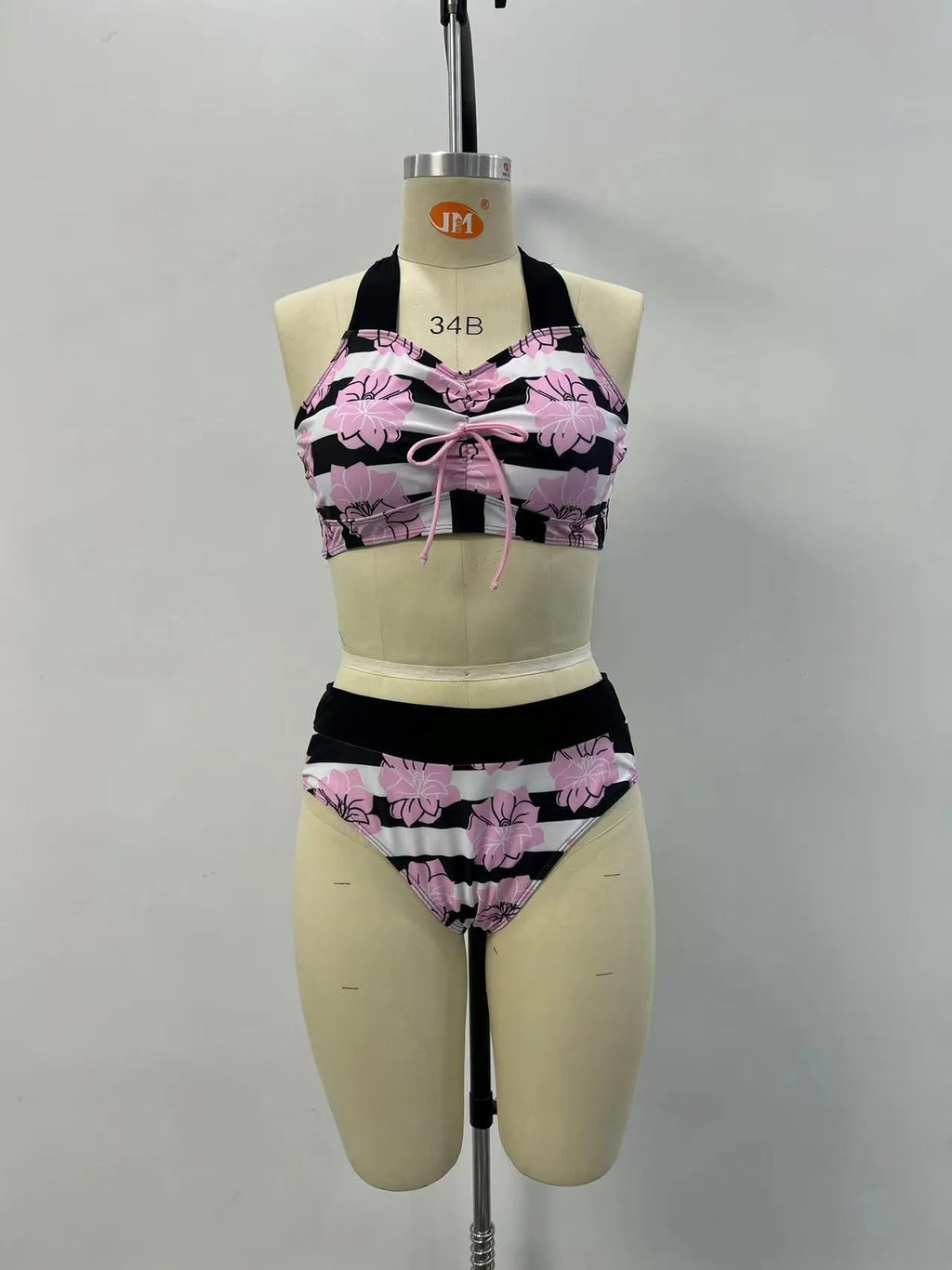 Black women's split bikini with printed belly coverage design for swimming