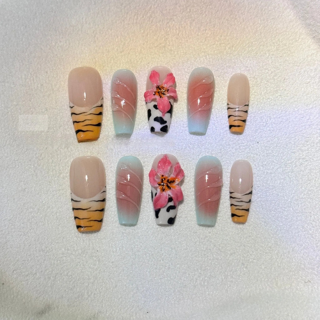 Zebra pattern lily hand carving nail art set showing embossed designs in multiple sizes