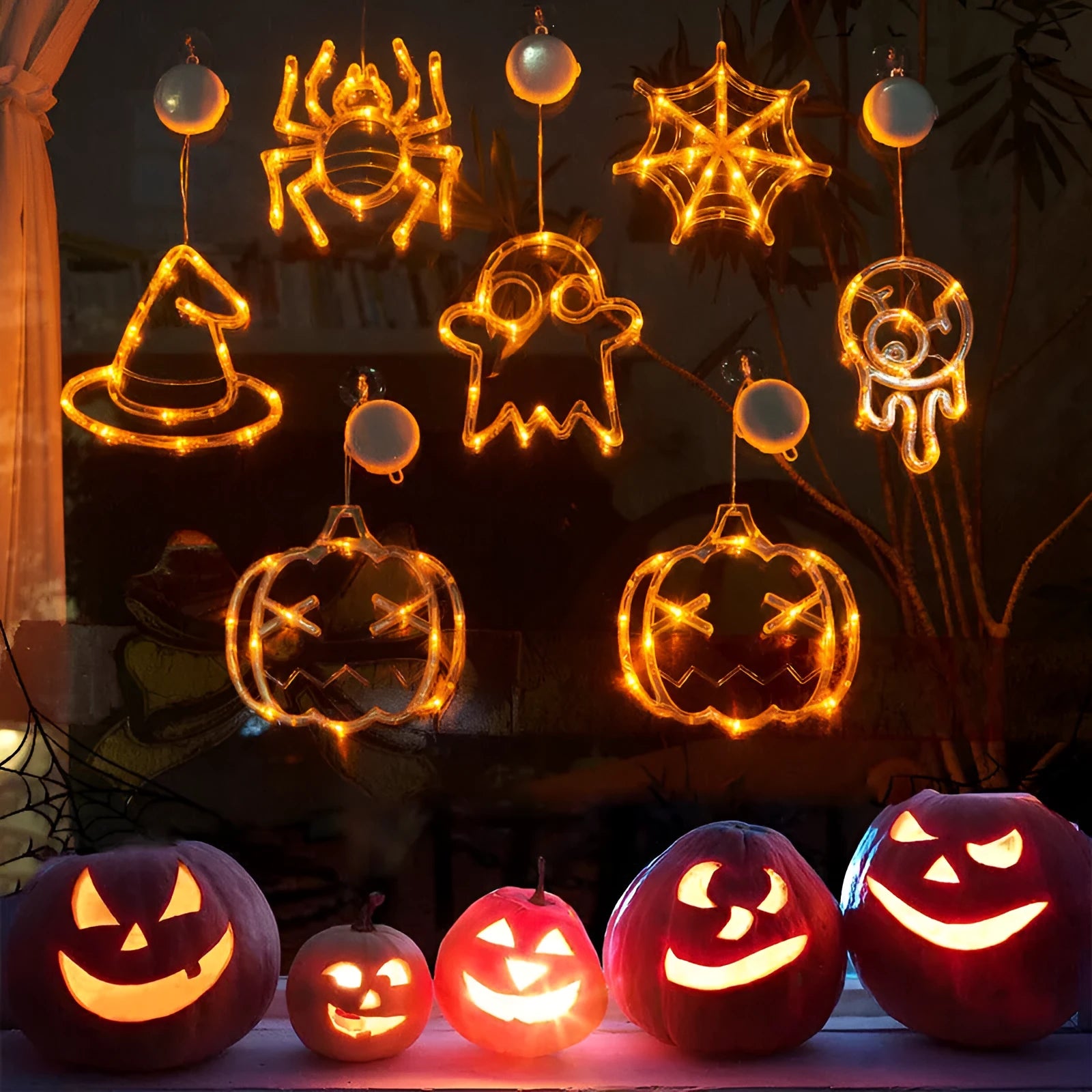Seven Halloween LED hanging lights with spider, pumpkin and ghost designs featuring suction cups