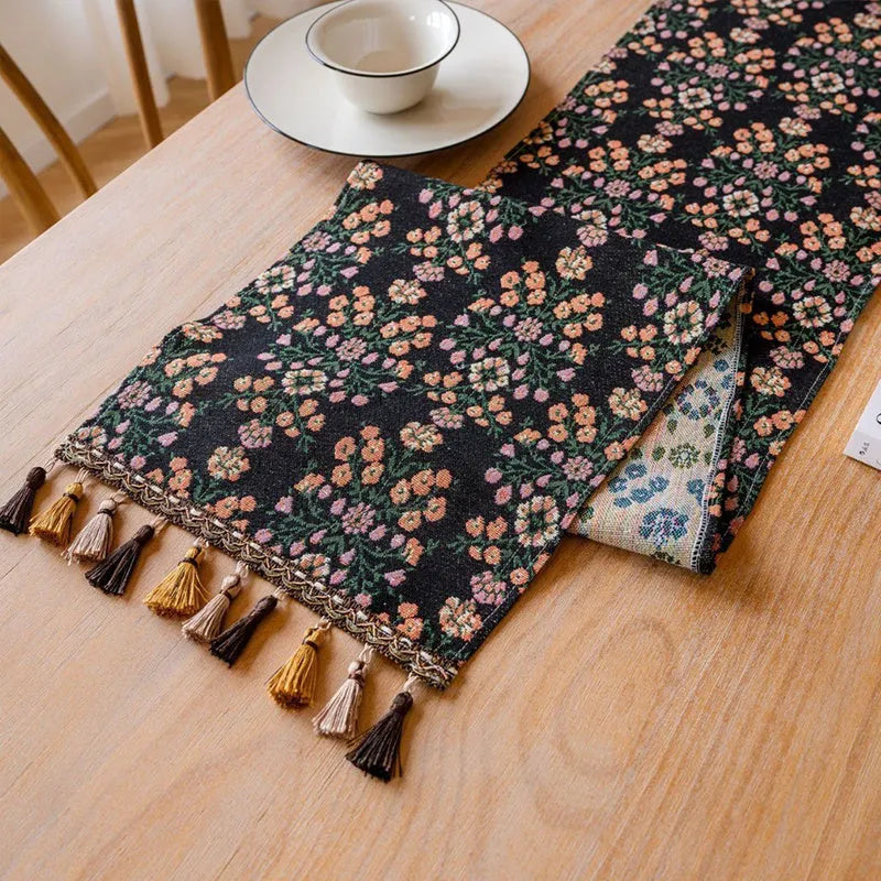 Nordic jacquard table runner with striped pattern and tassel fringe trim in dark blue colour