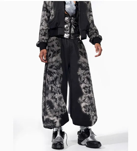 Women's printed loose-fit co-ord set showing hoodie, trousers, and seven-inch shorts together