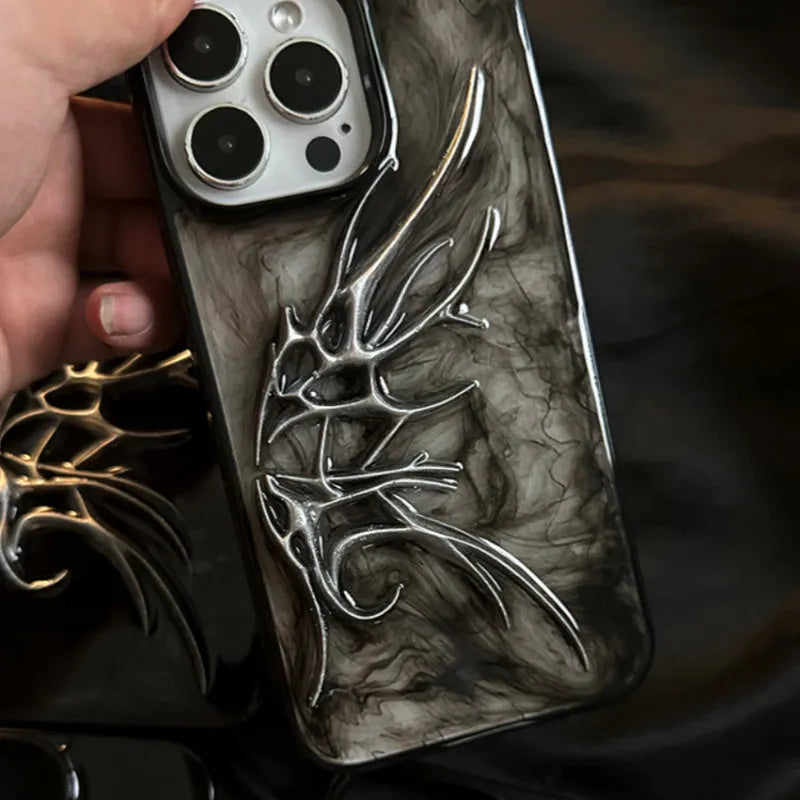 Black iPhone case with three-dimensional blurred wings design showing raised edges and precise port cutouts