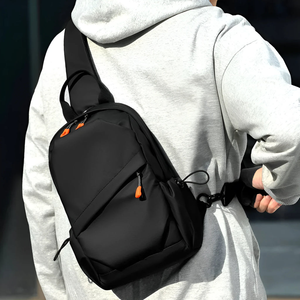 Men's black polyester crossbody bag with single shoulder strap and waterproof features