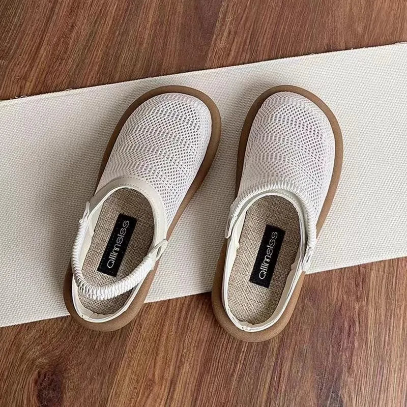 Beige Mori girl style slip-on shoes with a round toe and linen upper on a soft rubber sole.