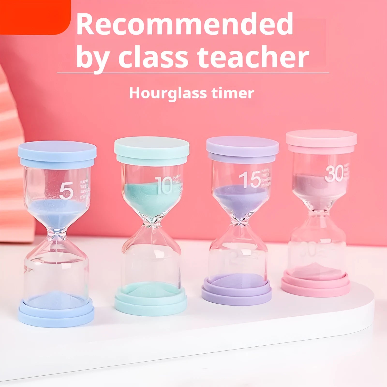 A glass hourglass sand timer on a desk, showing purple sand flowing between bulbs.