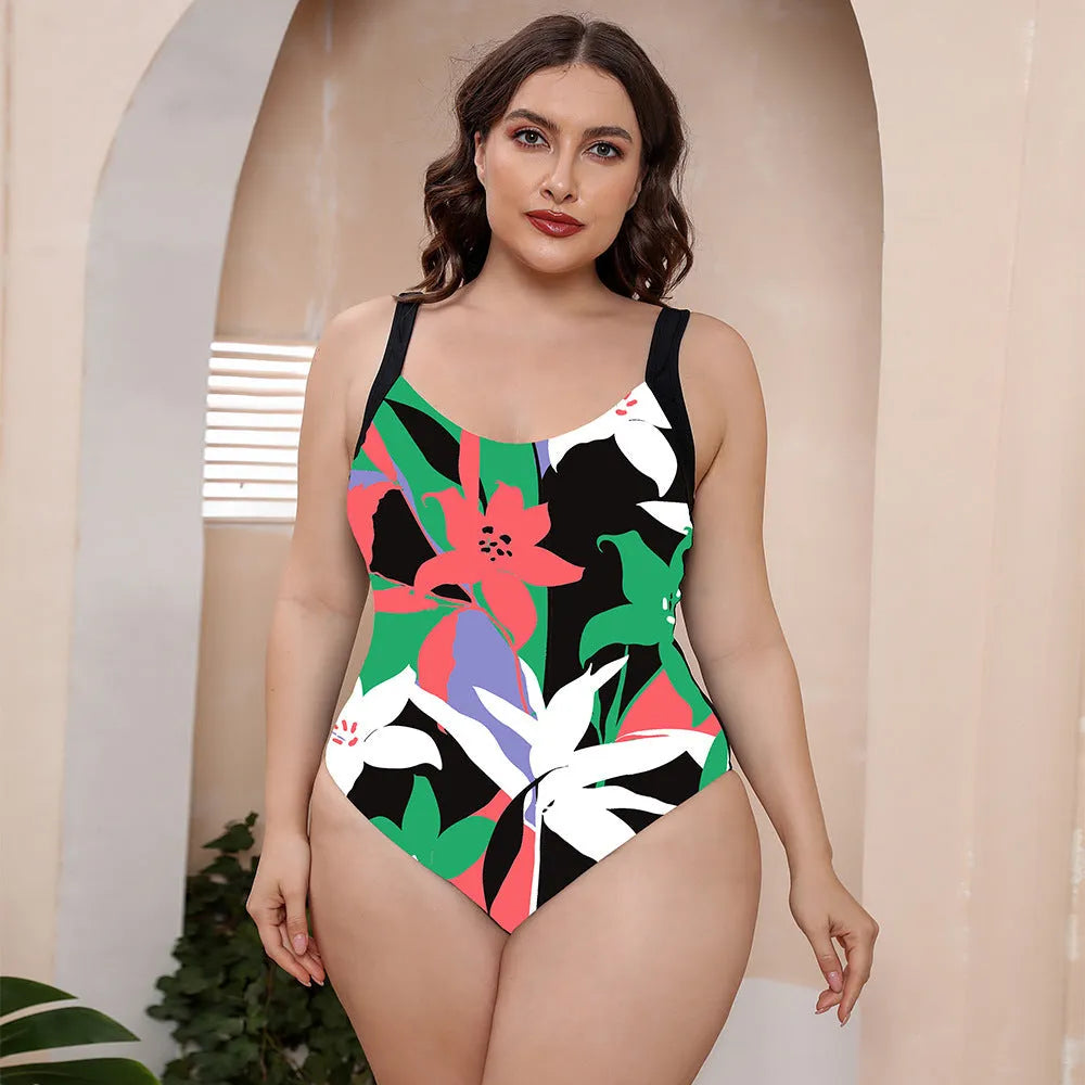 Conservative vest-style one-piece floral print swimsuit with spaghetti straps on a mannequin.