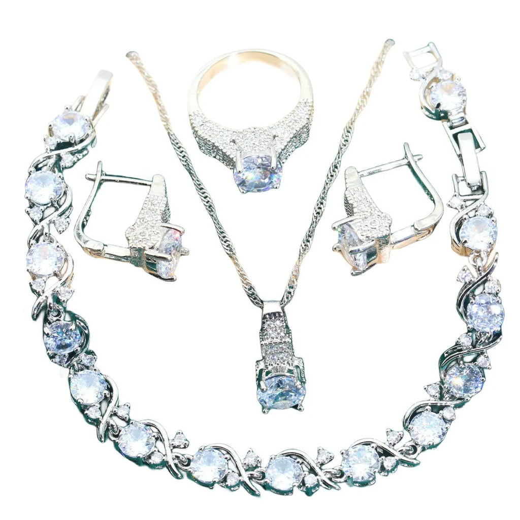 Four-piece bridal jewellery set showing necklace, bracelet, earrings and ring with alloy zircon and water wave chain design