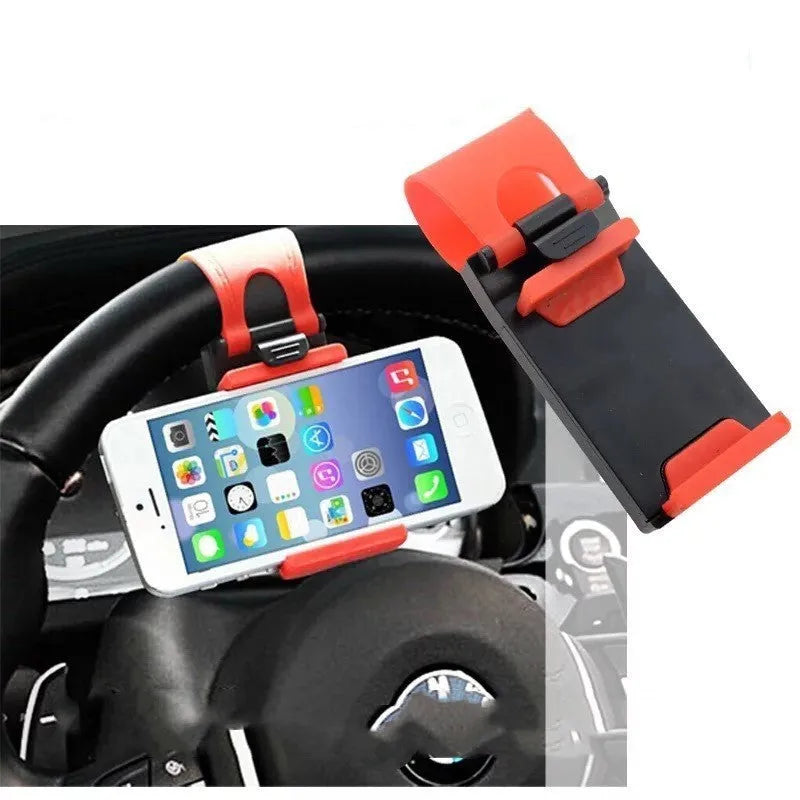 Black universal car steering wheel mobile phone holder made of ABS plastic shown mounted on a steering wheel.