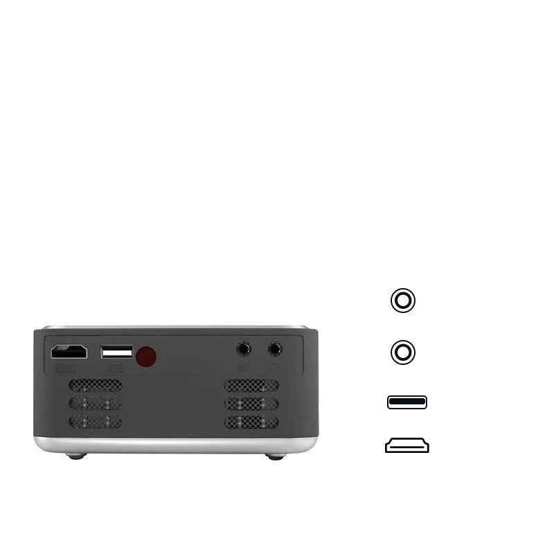 T20 Mini Projector in silver black with LED lens, remote control, and power cord on a table