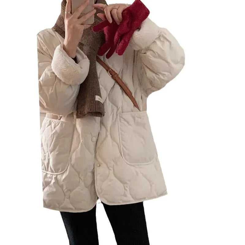 Women's collarless fleece jacket in Apricot with diamond pattern, loose straight fit, and polyester fabric