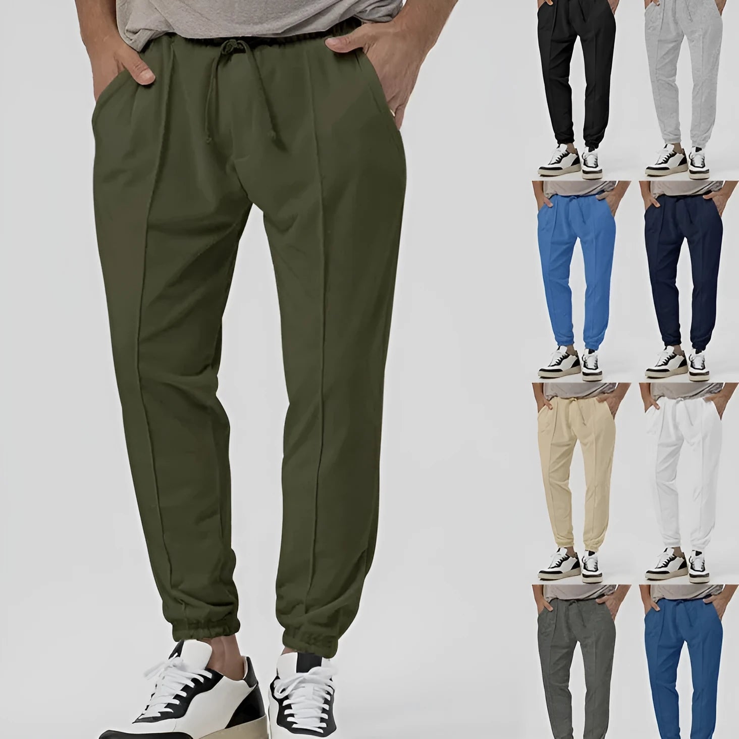 Men's grey straight-leg track sweatpants with a mid-waist, showcasing a relaxed fit and casual style.