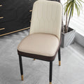 A solid-colour leather horseshoe-shaped seat cushion on a chair, showing its non-slip base and 2.5cm thickness.