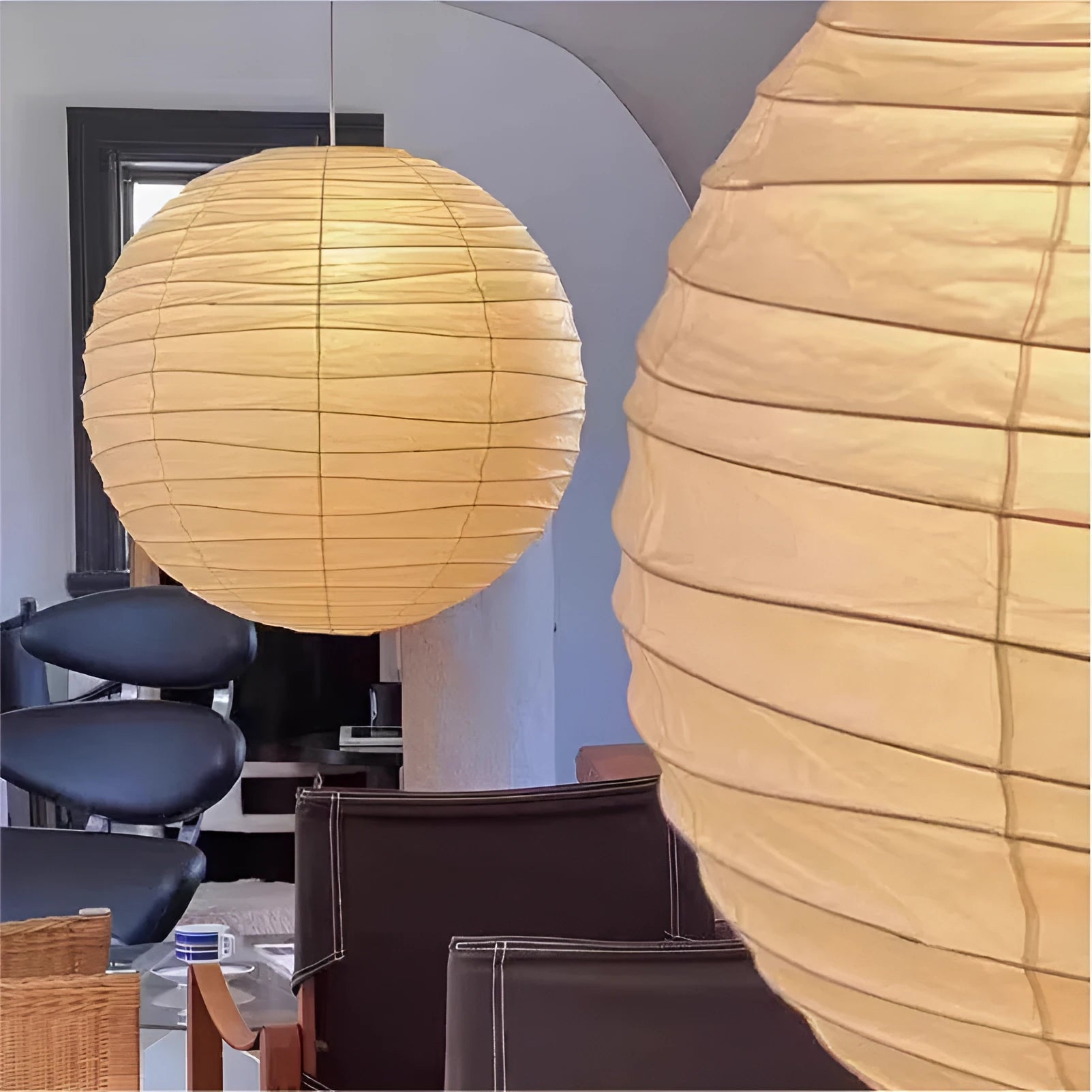 Japanese rice paper chandelier in living room setting with soft ambient lighting