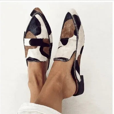 Women's black and white apricot suede shoes with imitation horse hair decoration and pointed toe