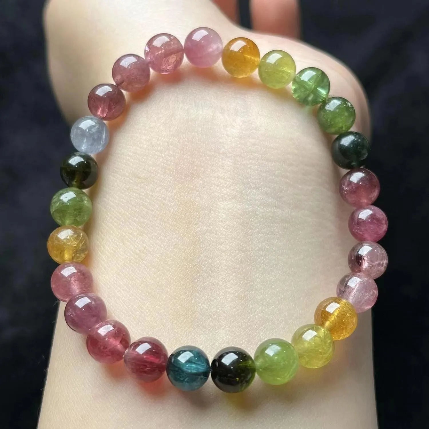 Colourful tourmaline bracelet with four-leaf clover pearl pendant in geometric drop shape