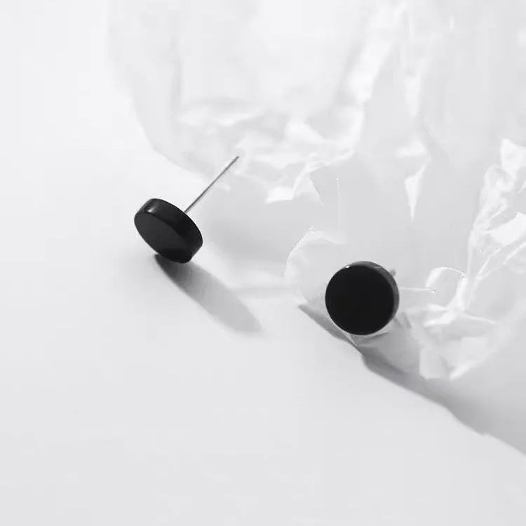 S999 Sterling Silver geometric round stud earrings in black and silver colours, showing size range from 3mm to 8mm.